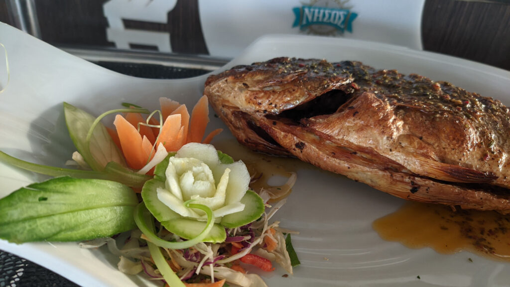 Nisos Restaurant Corfu Fish dish with garnish
