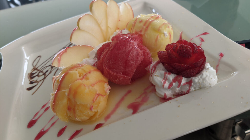Nisos Restaurant Corfu dessert with ice cream and strawberries